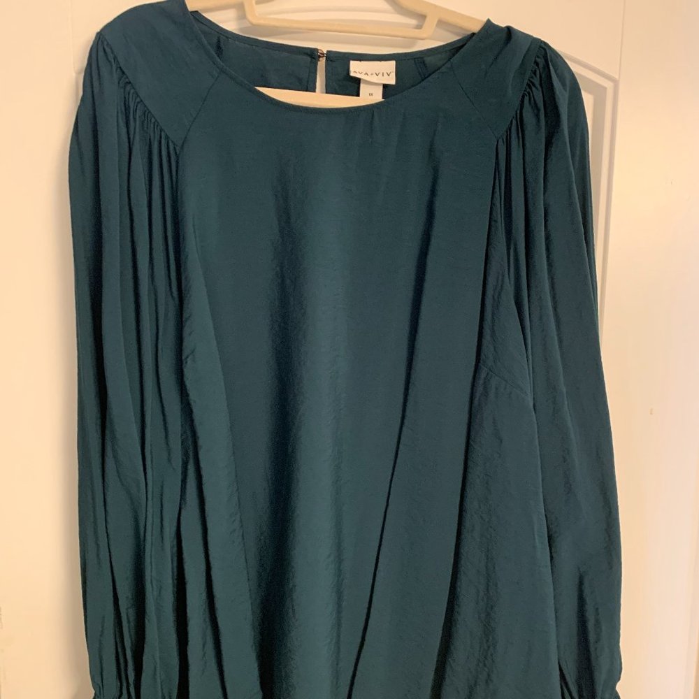 Ava Viv Long-Sleeved Blouse with a Single Button Slit Back.